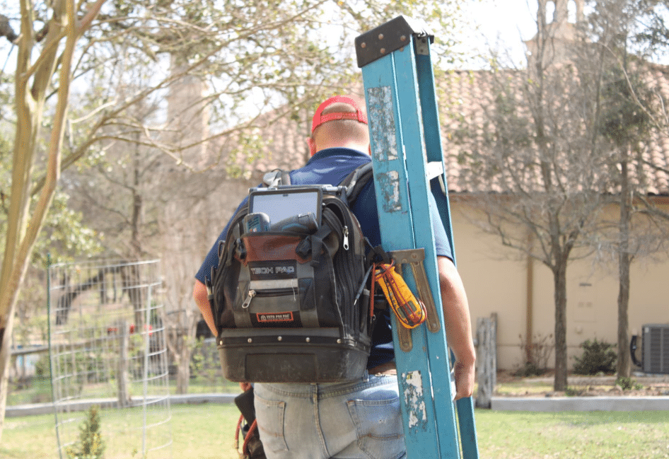 technician walking back to company truck after furnace tune-up